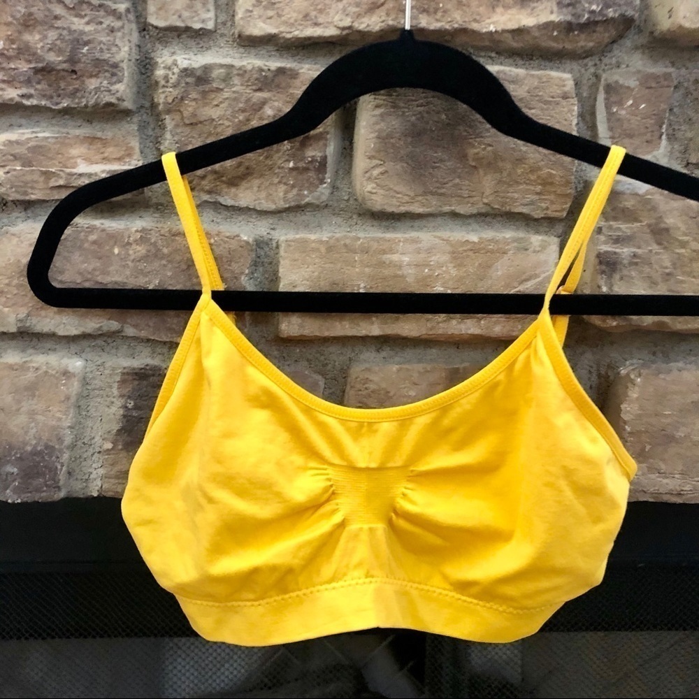NWOT bright yellow, adjustable straps bra. One Size